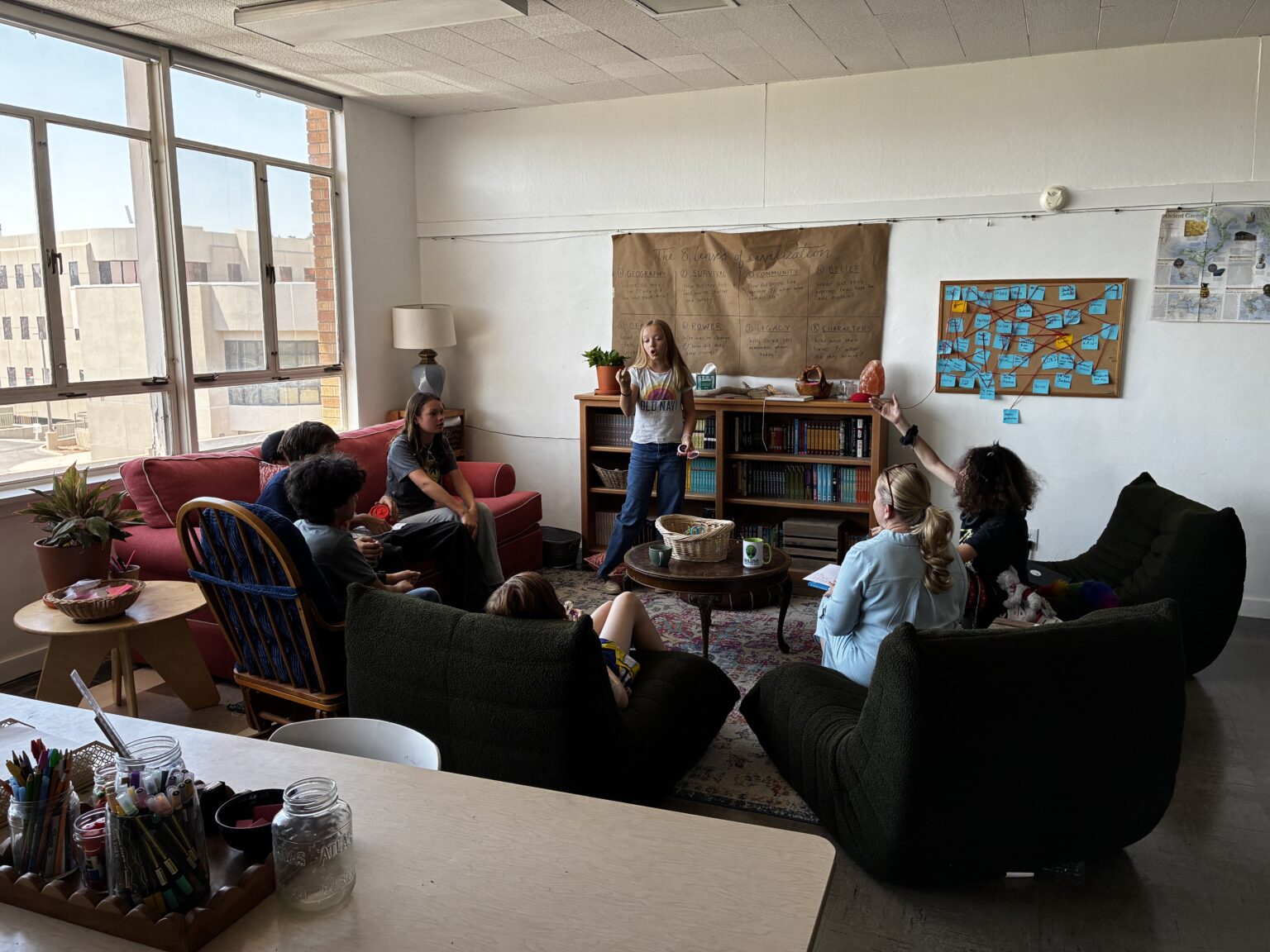 Treehouse middle school students gathered for a collaborative classroom discussion