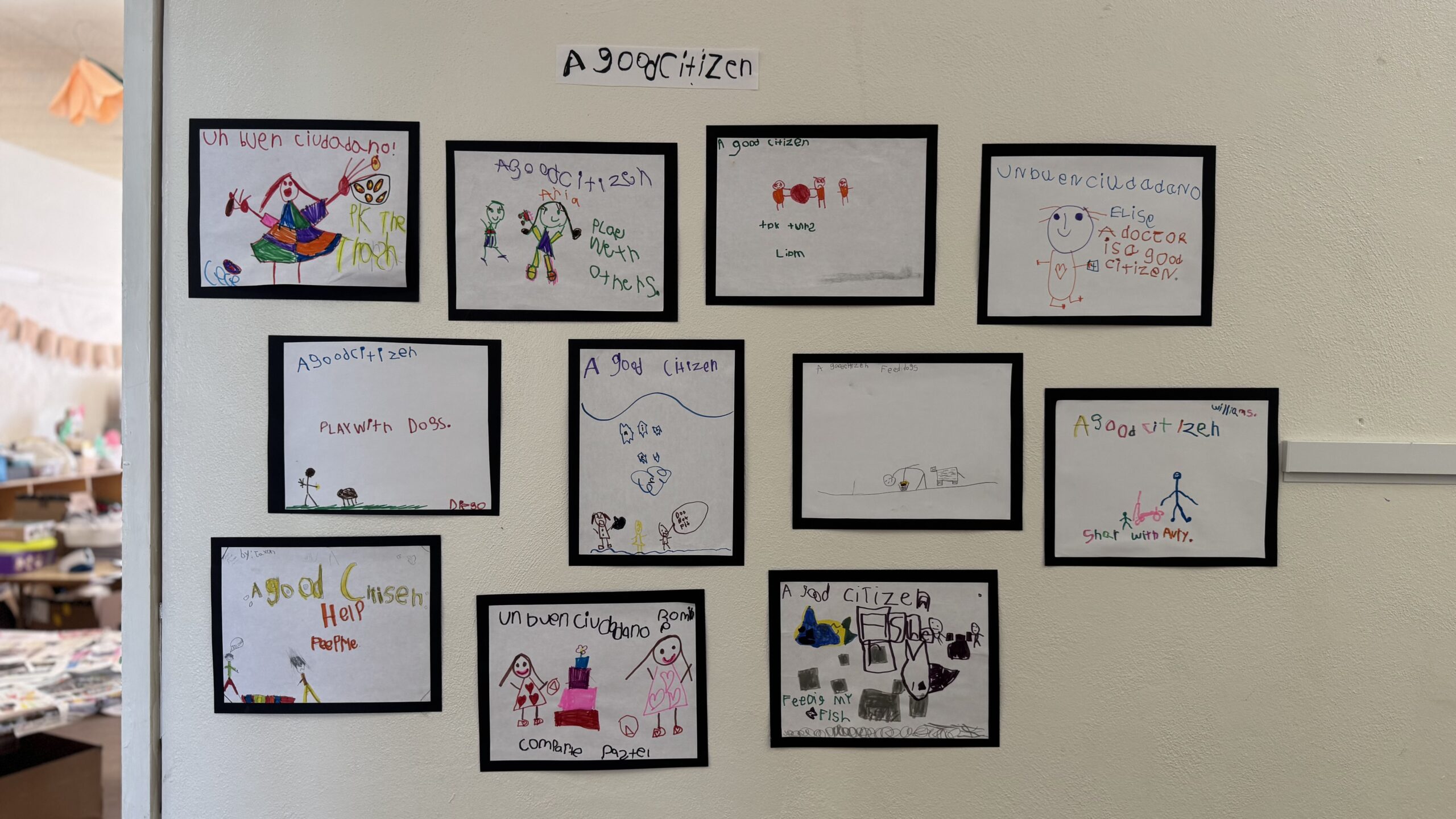 Children’s illustrated work displayed in the classroom